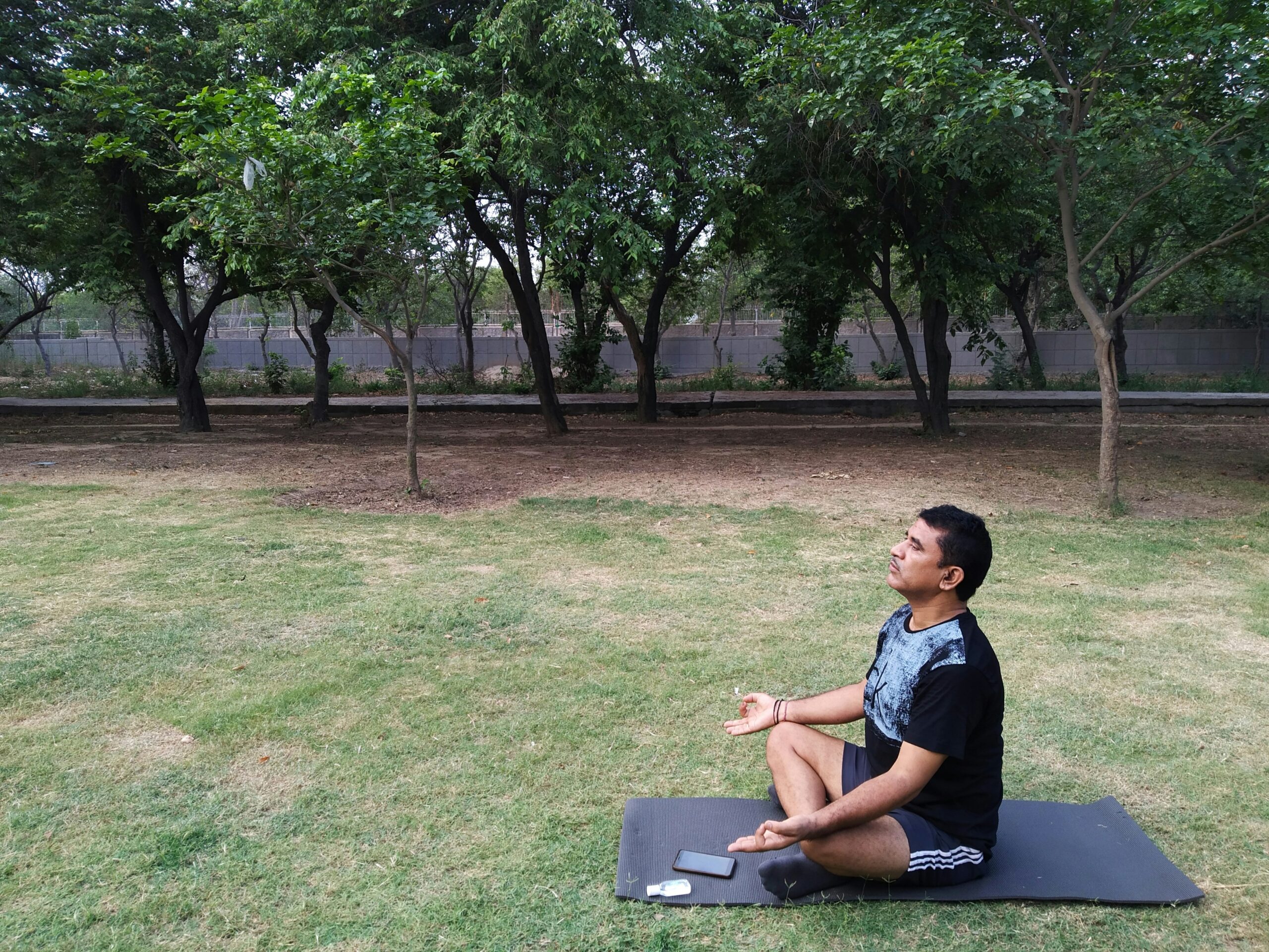 Woman demonstrating correct seated breathing posture